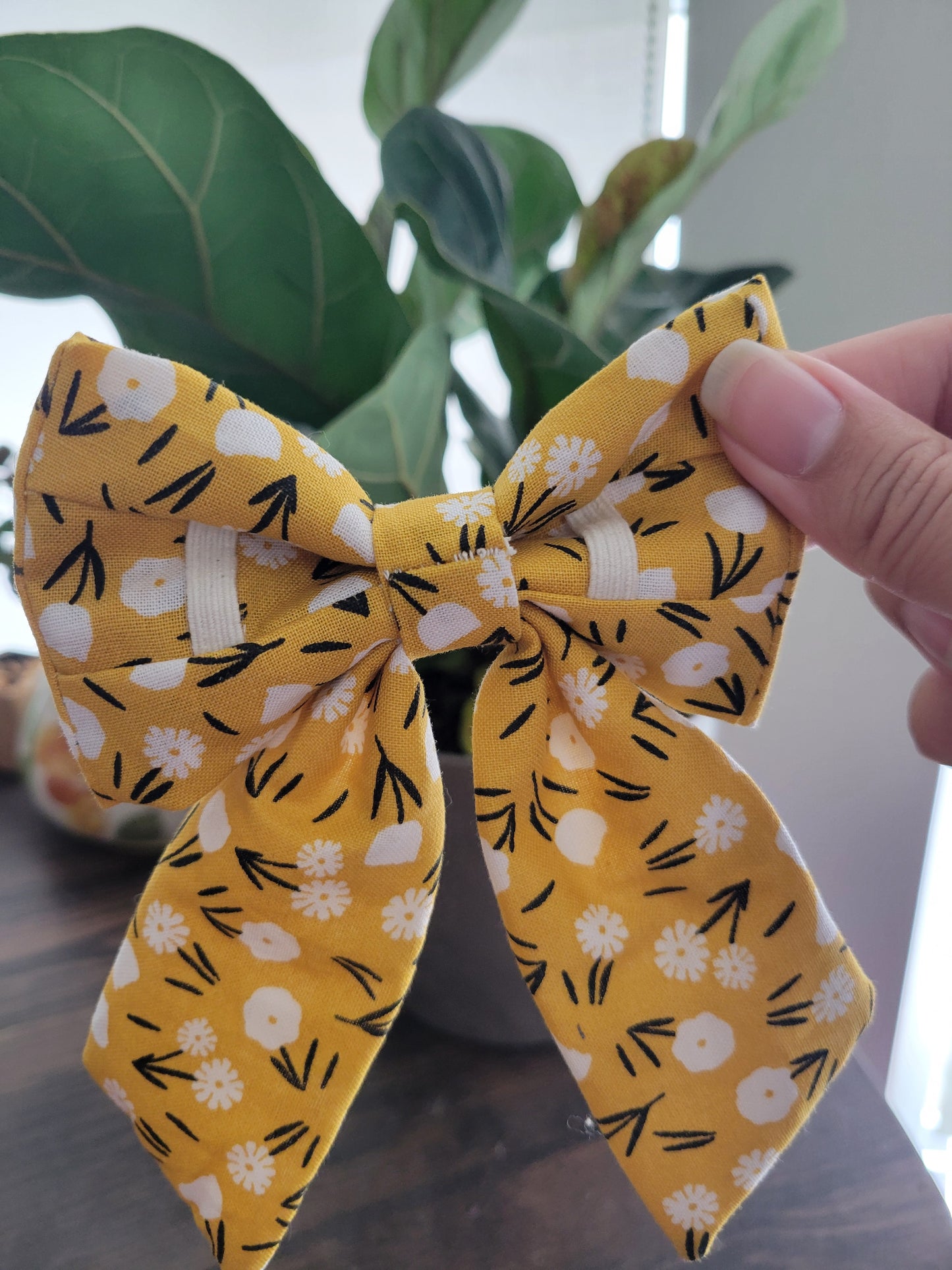 Penelope over the collar bow