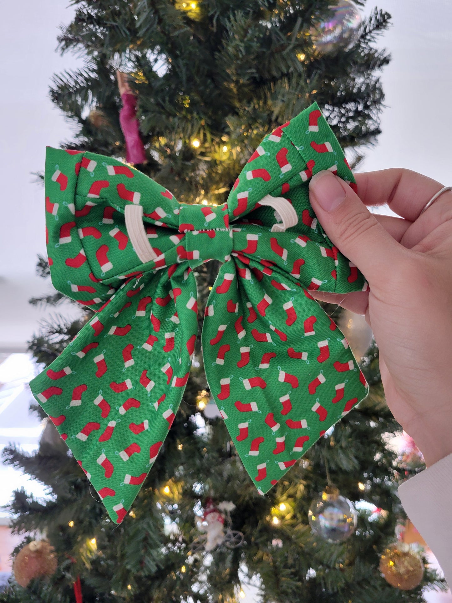 Stocking Stuffer over the collar bow