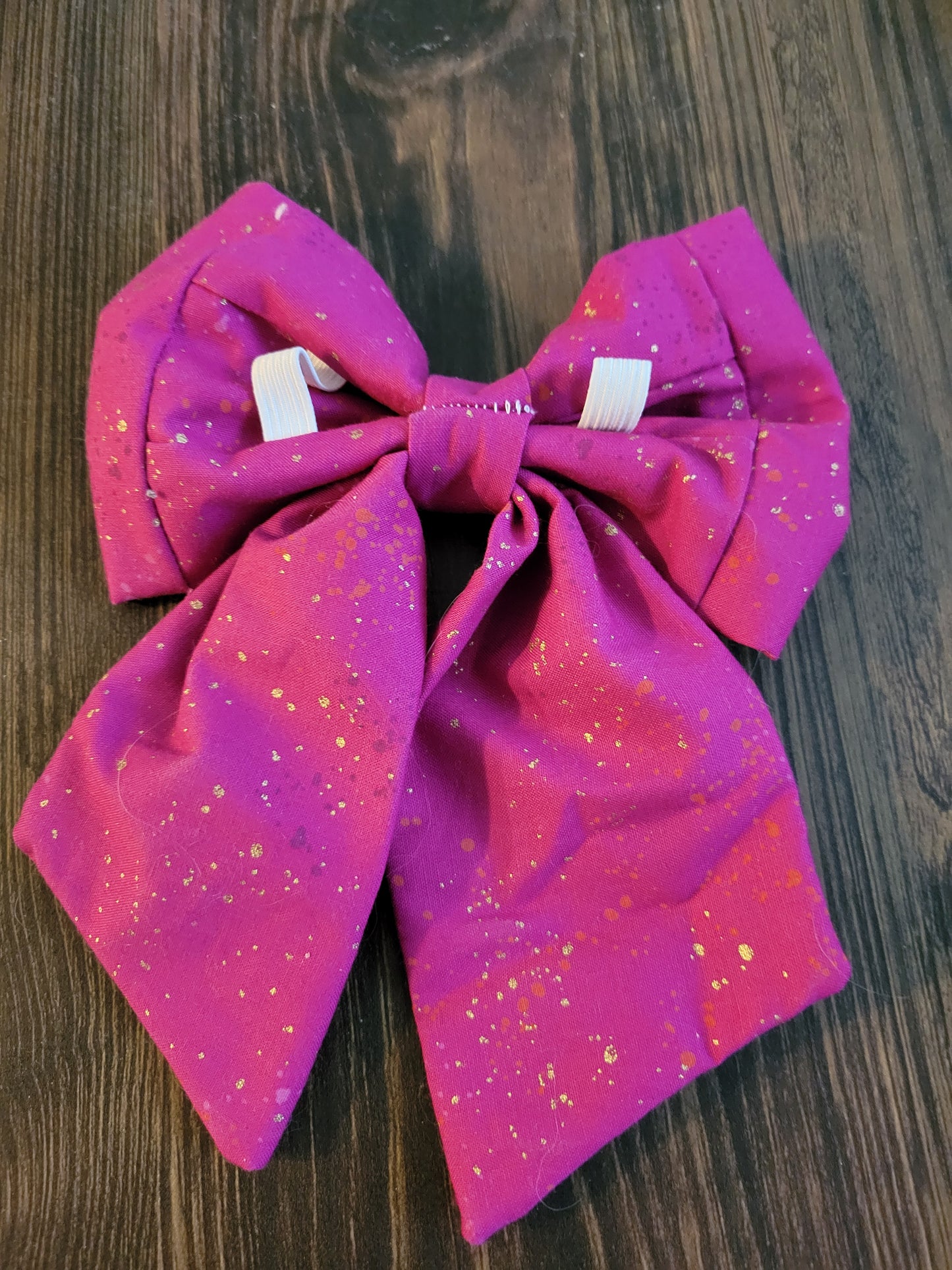 Pink Sparkle over the collar bow